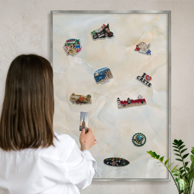Souvenir magnet display board with a silver frame Subtle elegance