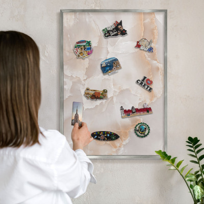Souvenir magnet display board with a silver frame Subtle waves