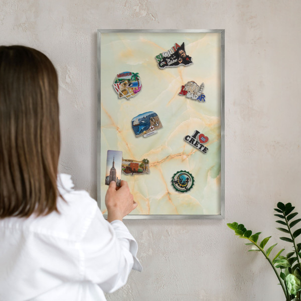 Souvenir magnet display board with a silver frame Marble elegance