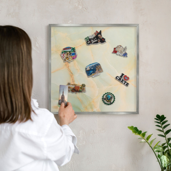 Souvenir magnet display board with a silver frame Marble elegance