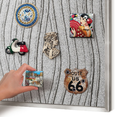 Souvenir magnet display board with a silver frame Gray waves