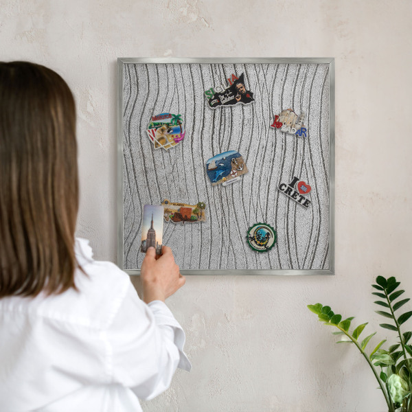 Souvenir magnet display board with a silver frame Gray waves