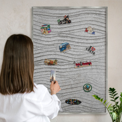 Souvenir magnet display board with a silver frame Gray waves