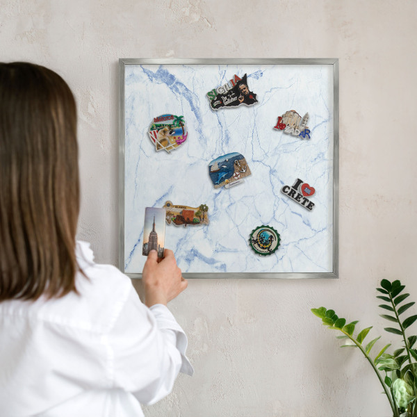 Souvenir magnet display board with a silver frame Marble design