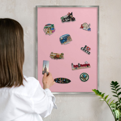 Souvenir magnet display board with a silver frame Light pink