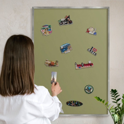 Souvenir magnet display board with a silver frame Green grass