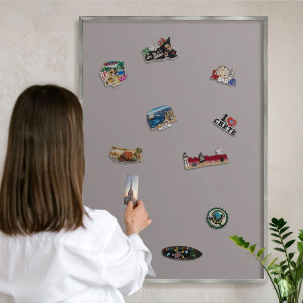 Souvenir magnet display board with a silver frame Ash gray