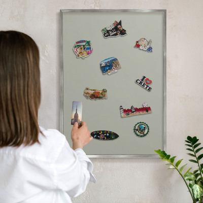 Souvenir magnet display board with a silver frame Neutral gray