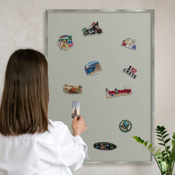 Souvenir magnet display board with a silver frame Neutral gray