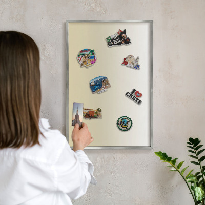 Souvenir magnet display board with a silver frame Cream gradient