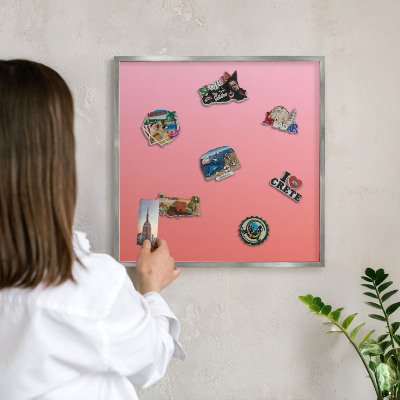 Souvenir magnet display board with a silver frame Pink orange