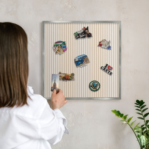Souvenir magnet display board with a silver frame Vertical stripes