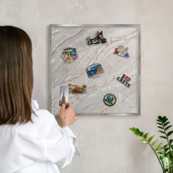 Souvenir magnet display board with a silver frame Marble elegance