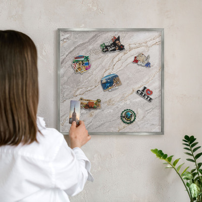 Souvenir magnet display board with a silver frame Marble elegance