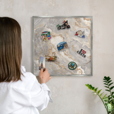 Souvenir magnet display board with a silver frame Marble elegance