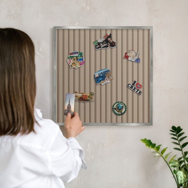 Souvenir magnet display board with a silver frame Vertical stripes