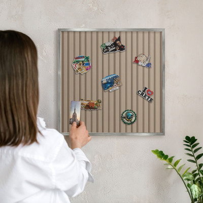 Souvenir magnet display board with a silver frame Vertical stripes