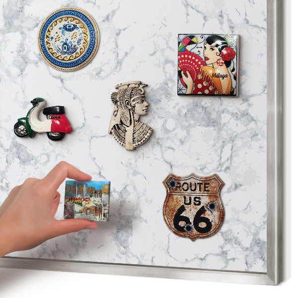 Souvenir magnet display board with a silver frame Marble aesthetics