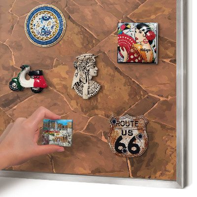 Souvenir magnet display board with a silver frame Stone structure