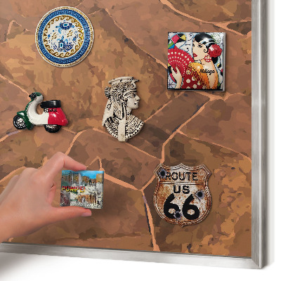 Souvenir magnet display board with a silver frame Stone structure
