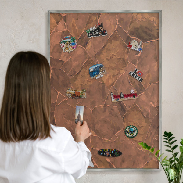 Souvenir magnet display board with a silver frame Stone structure