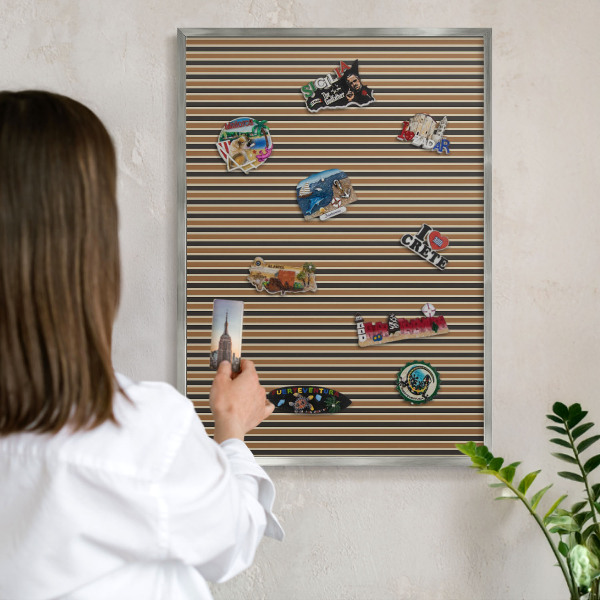 Souvenir magnet display board with a silver frame Geometric pattern