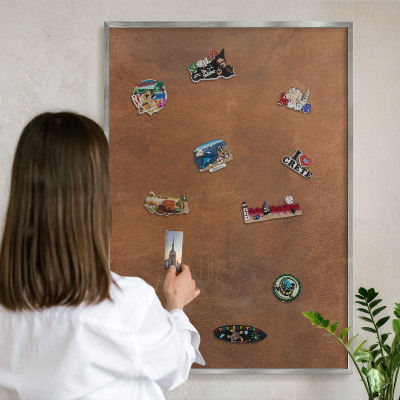 Souvenir magnet display board with a silver frame Brown texture