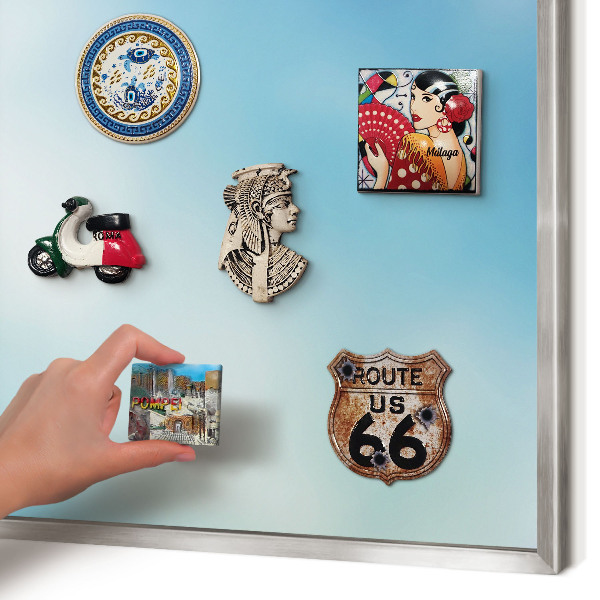 Souvenir magnet display board with a silver frame Blue sky