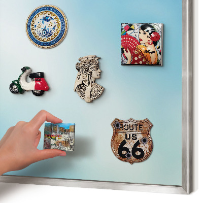 Souvenir magnet display board with a silver frame Blue sky