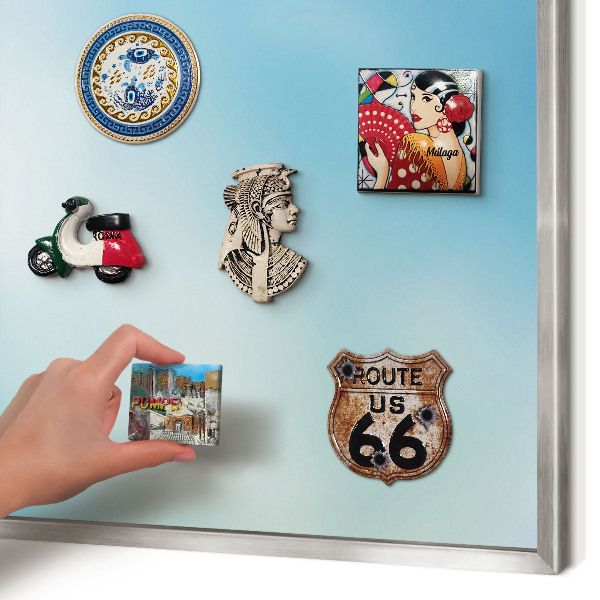 Souvenir magnet display board with a silver frame Blue sky