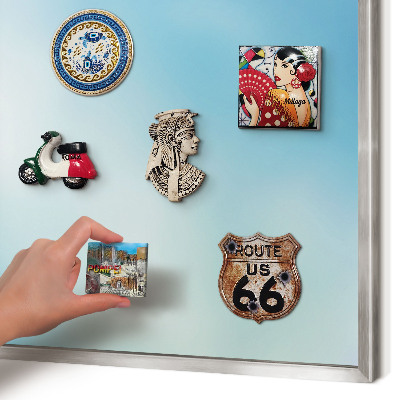 Souvenir magnet display board with a silver frame Blue sky