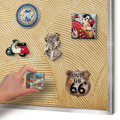 Souvenir magnet display board with a silver frame Structural lines