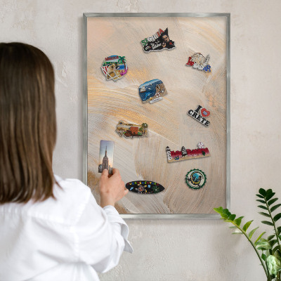 Souvenir magnet display board with a silver frame Elegant abstraction