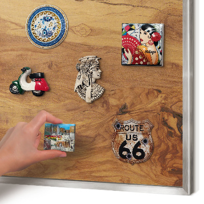 Souvenir magnet display board with a silver frame Natural wood