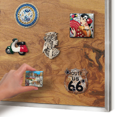Souvenir magnet display board with a silver frame Natural wood