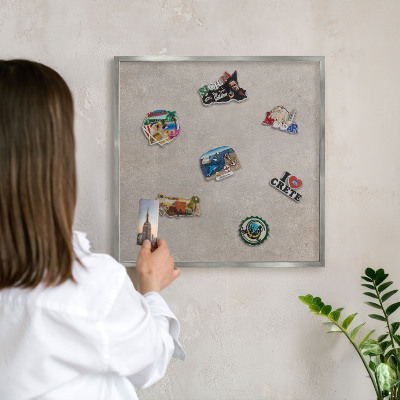 Souvenir magnet display board with a silver frame Neutral elegance