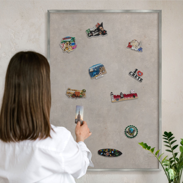 Souvenir magnet display board with a silver frame Neutral elegance