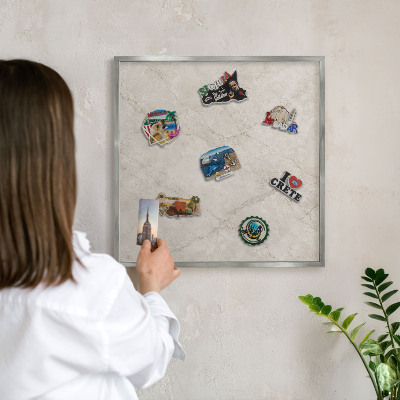 Souvenir magnet display board with a silver frame Natural elegance