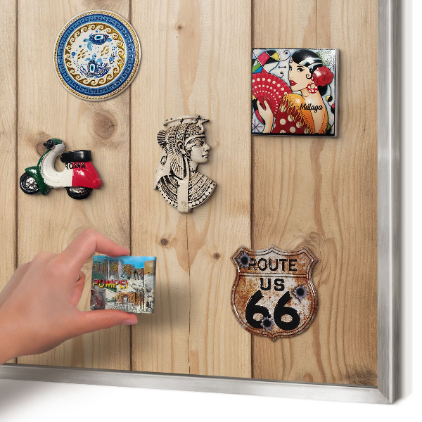 Souvenir magnet display board with a silver frame Wooden texture