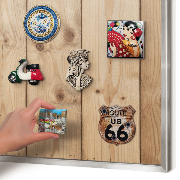 Souvenir magnet display board with a silver frame Wooden texture