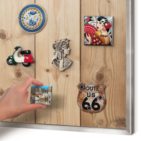 Souvenir magnet display board with a silver frame Wooden texture