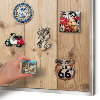 Souvenir magnet display board with a silver frame Wooden texture