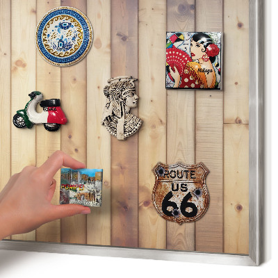 Souvenir magnet display board with a silver frame Wooden boards