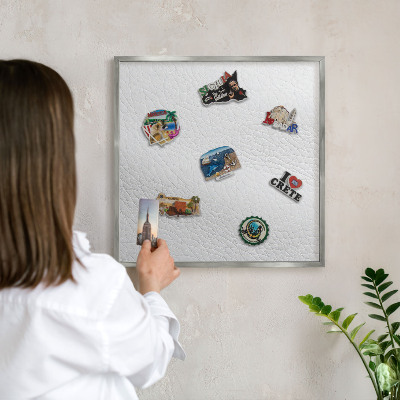 Souvenir magnet display board with a silver frame Elegant texture