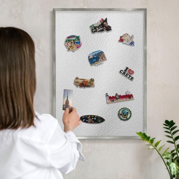 Souvenir magnet display board with a silver frame Elegant texture