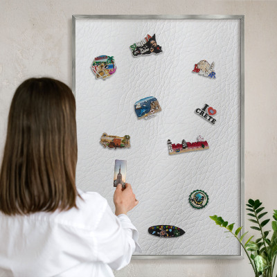 Souvenir magnet display board with a silver frame Elegant texture