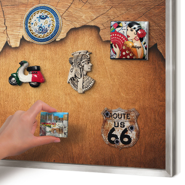 Souvenir magnet display board with a silver frame Wooden texture