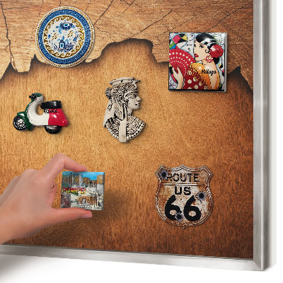 Souvenir magnet display board with a silver frame Wooden texture