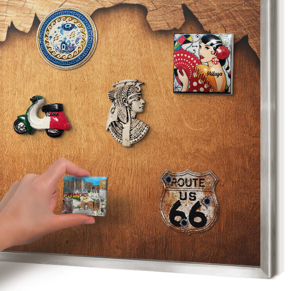 Souvenir magnet display board with a silver frame Wooden texture