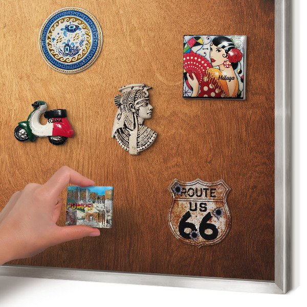 Souvenir magnet display board with a silver frame Wooden texture